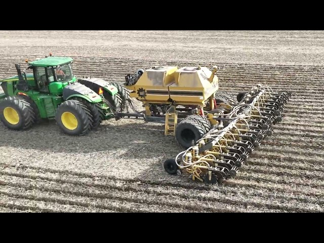 CANADIAN FARMER - MASSIVE STRIP TILLER - Soil Warrior 4550XDXX2 16 row prepping  spring corn plant.