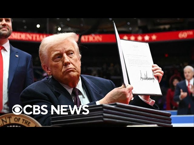 Trump signs flurry of executive orders in front of supporters