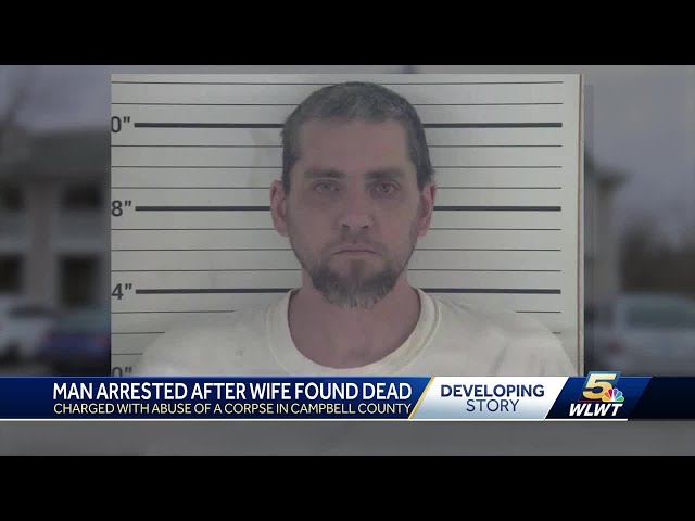 Docs: Husband charged, allegedly lived with wife's decaying body for days