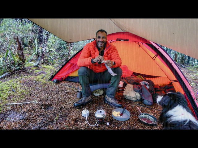 Tent Camping On A Mountain In Rain