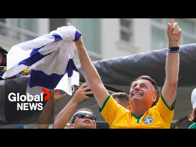 Former Brazilian president Bolsonaro holds rally, defends himself amid coup probe