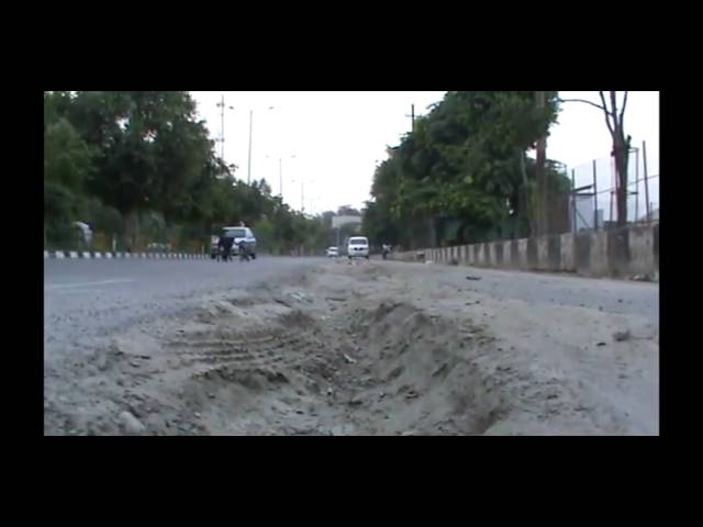 Noida sector 18 roads broken and full of potholes..Noida Authority turning blind eye