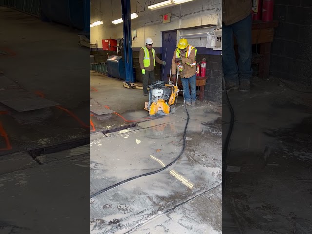 Contractors Saw Cutting Concrete