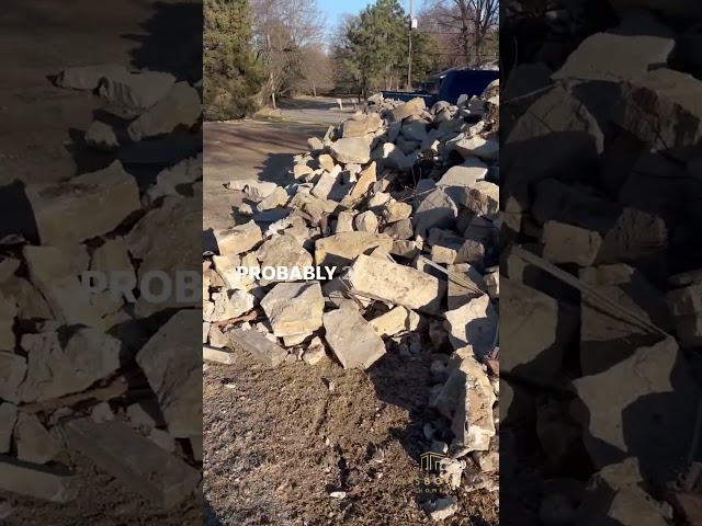 Huge Stone Pile in Middle of Yard