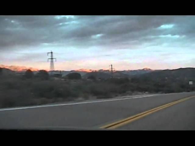 The sun sets over Tonto National Monument, in Arizona.