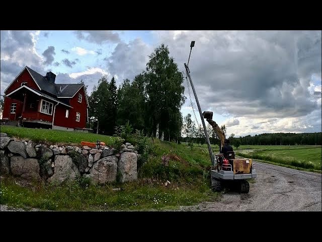 Taking down a left over lamp post with my Yanmar B37