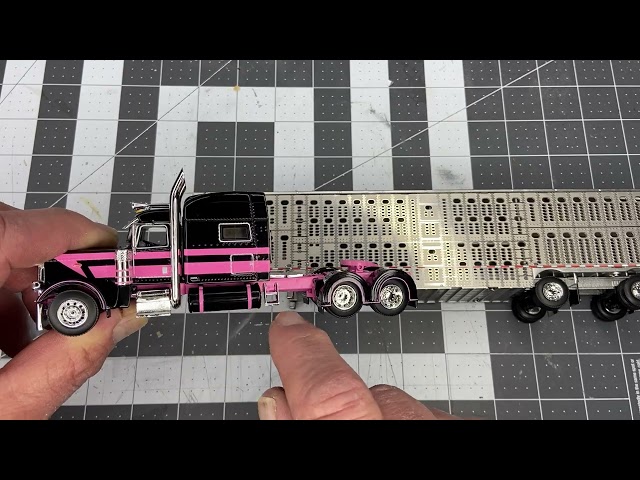 Review: DCP 601462 Pink & Black Peterbilt 389 with spread axle Cattle Pot