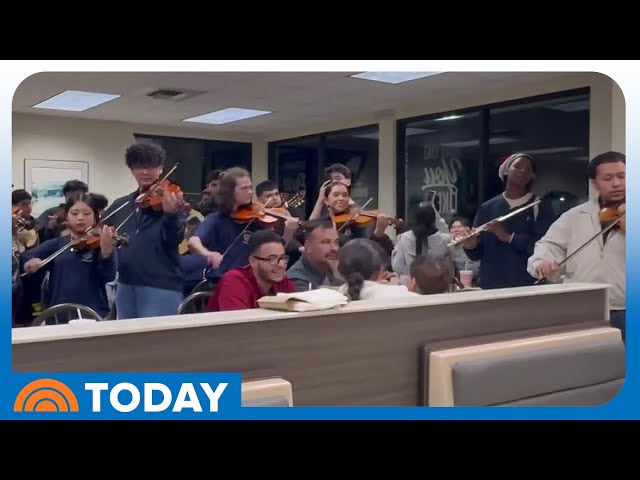 Watch two mariachi bands from rival schools perform at burger joint