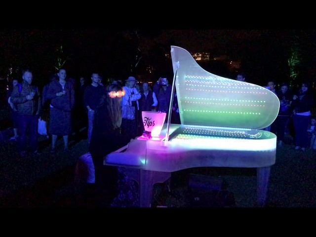 Playing "Imagine" on a lighted grand in San Francisco