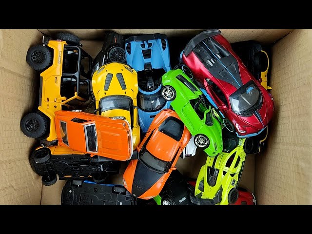 Box Full of Model Cars -Mazda Mx5, Koenigesgg Jesko, Lamborghini Scv12, Byd Yang Wang U8, Toyota Car