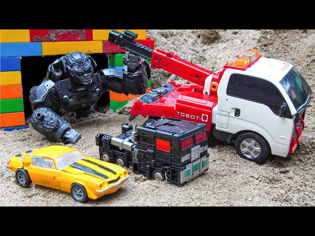 Transformers BATTLE MASTERS: Nemesis Optimus Primal Superhero Dinosaur in Cave - Stopmotion RobotCar