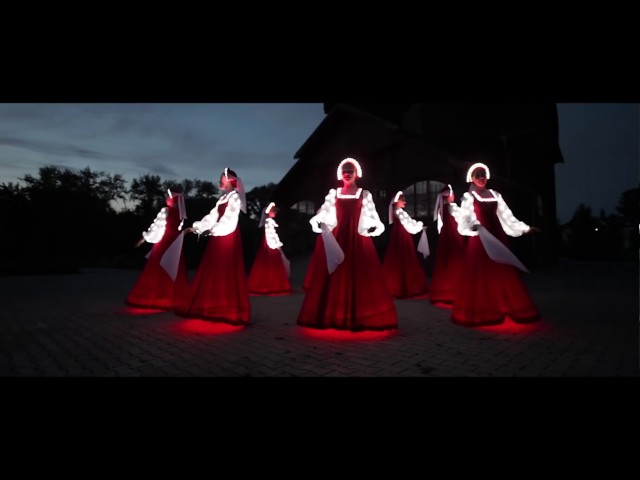 Russian folk dance in Siberia. Artists of LED show "CARE"