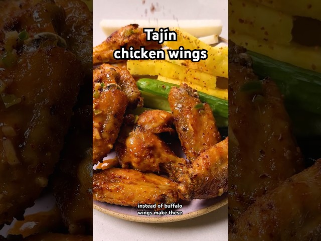 Tajín chicken wings. Recipe in the description! #shorts #superbowl #recipe #wings