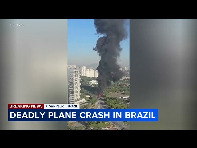 At least 2 killed after small plane crashes on busy street in Brazil