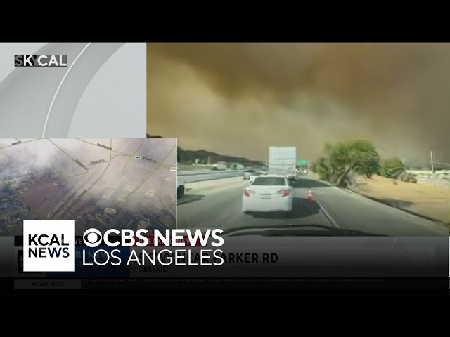 Traffic builds on northbound 5 Freeway in Castaic as Hughes Fire rages