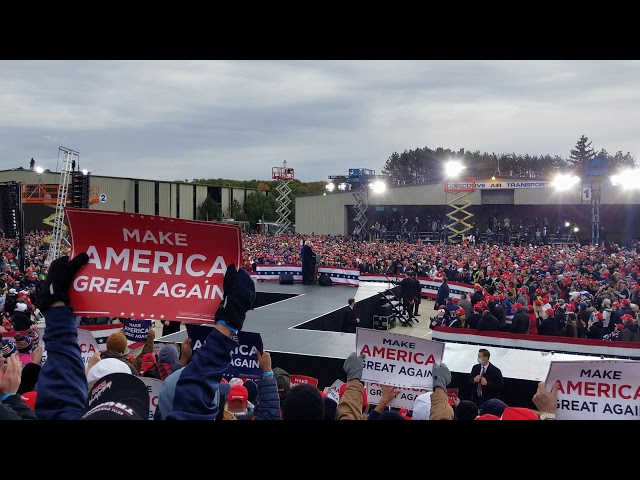 Trump Rally Muskegon Michigan 2020 - Trump on stage in front of the crowd.