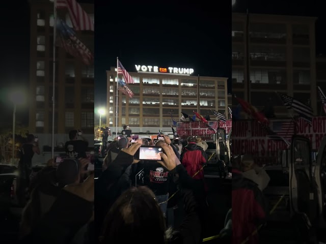 Enormous Trump sign lights the Amsterdam sky