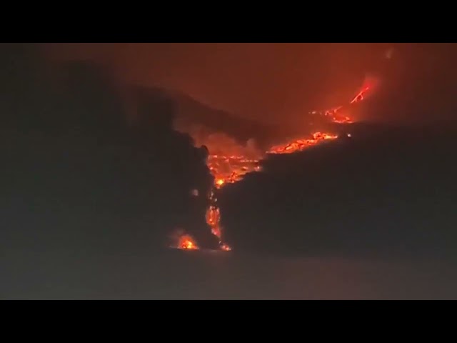 Volcano lava reaches the ocean.