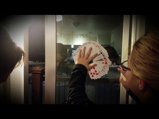 Magician pulls card through window by Lazarus Benson   YouTube