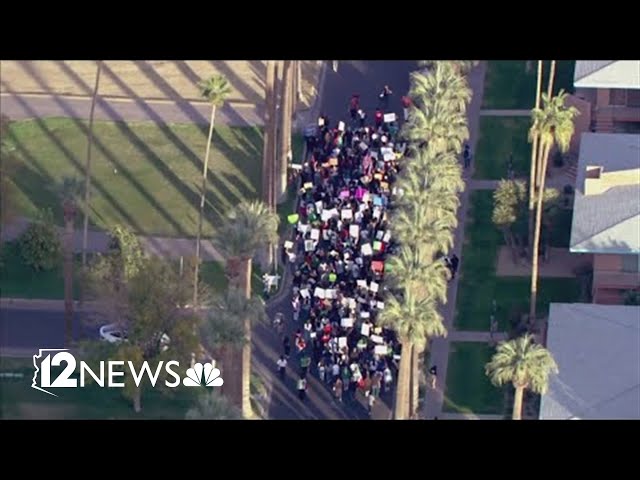 Immigration protesters gather in central Phoenix