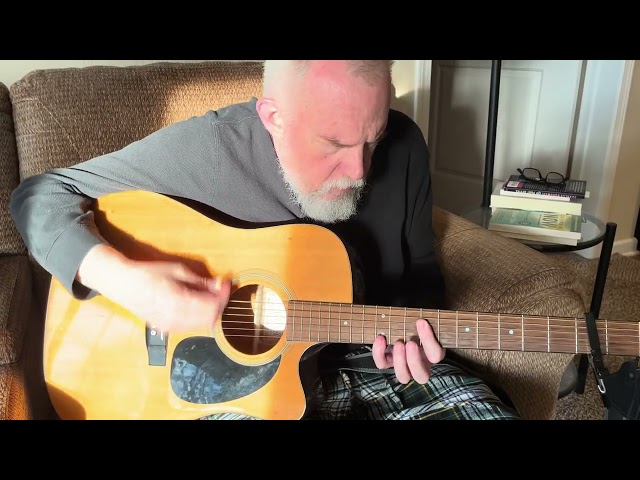 Guitar practice in the glorious summer sun