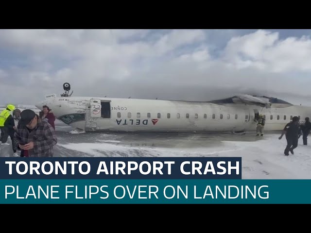 At least 15 injured after plane crash-lands and flips over at Toronto airport