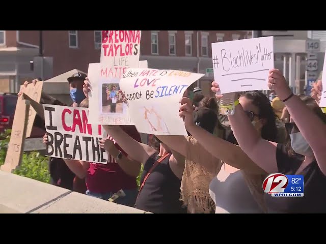 Taunton stand out for peace and justice rally