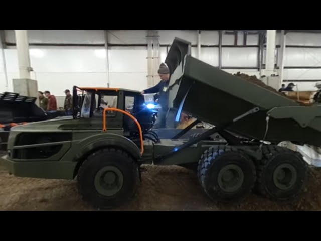 RC construction equipment working on the bridge at cabin fever 360