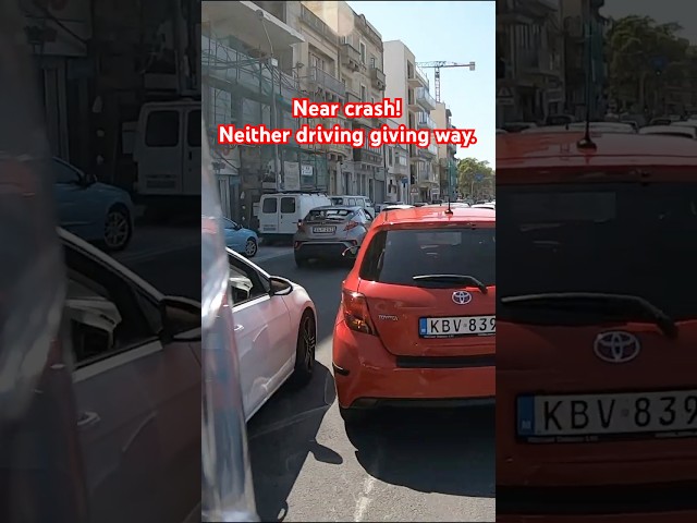 Cars nearly crash by not looking. Aggressive driving and lane chaos #automobile #malta #roadrage