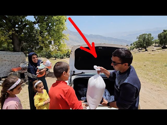 Kind friend: Mahmoud brings food for Akram and her family