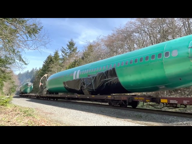 Boeing 737 fuselages get shoved from Mukilteo WA up to the Everett WA plant for final assembly