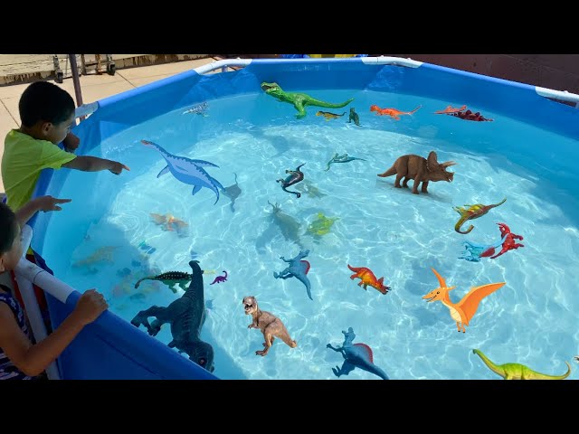 DINOSAUR Pool Collection | Learn Dinosaur Names! Giant T Rex , Velociraptors , Stegosaurus