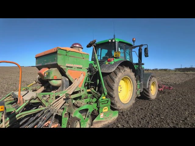 John Deere sowing Barley above Robin Hoods Bay