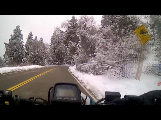 Riding my Honda Foreman on the Road in the Snow