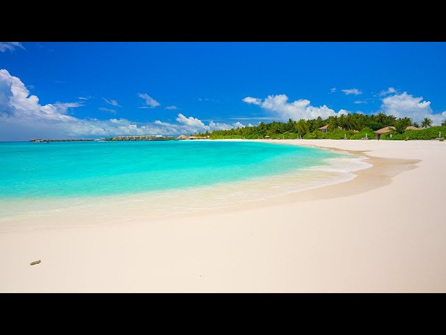 Beautiful Beach with Soothing Ocean Waves. Maldives Ocean 4K ULTRA HD