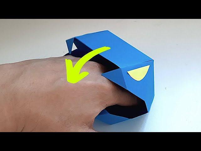 Origami snake head that bites your hands