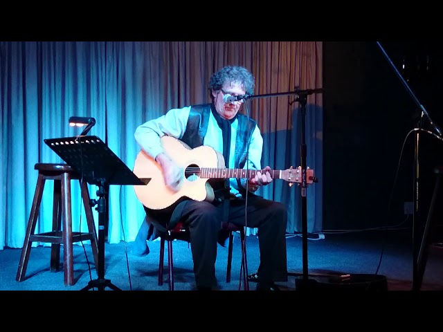 Mick Matthews performs "They Call me the Breeze" at TJs Acoustic Music Club