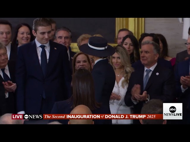 Melania Trump enters Capitol Rotunda for husband's inauguration