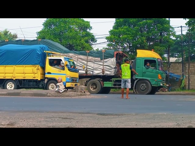 Long snake of a 40ft truck loaded with cargo