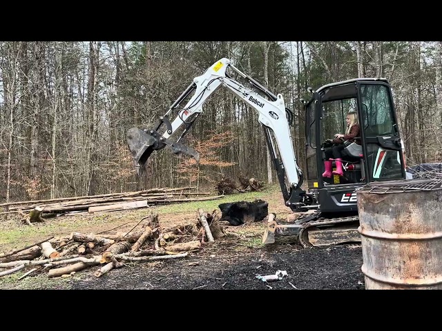 My grand baby on the excavator.