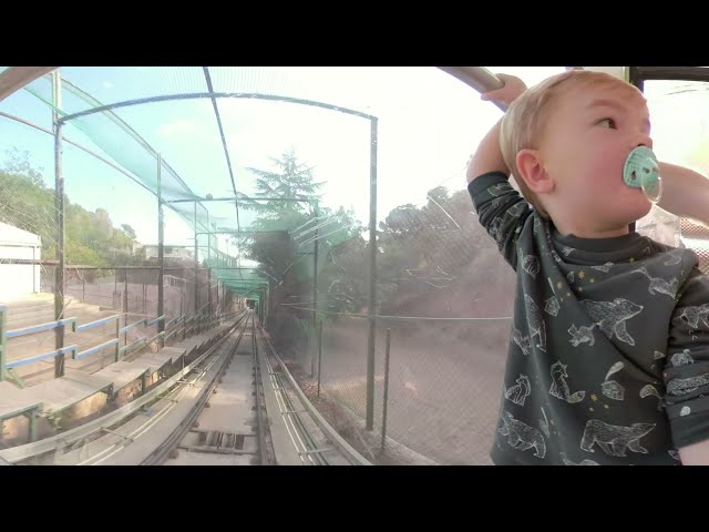 Barcelona's epic mountain nature trails. Father & son 360 travel exploring Spain. Cable car ride.