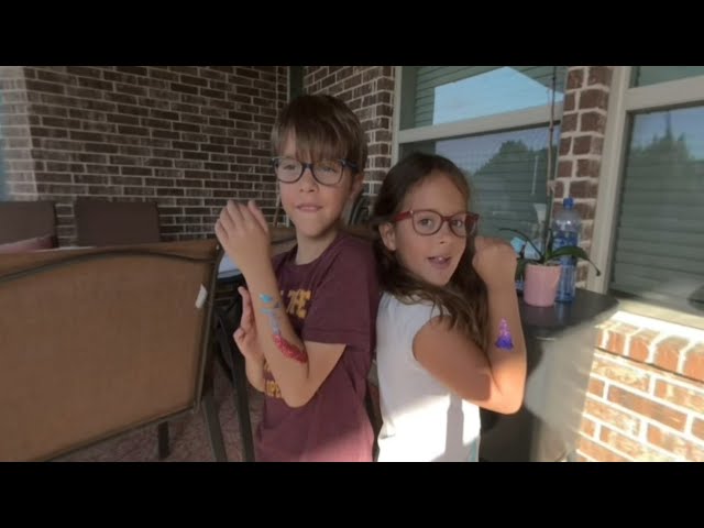 DIY glitter tattoos on the twins.