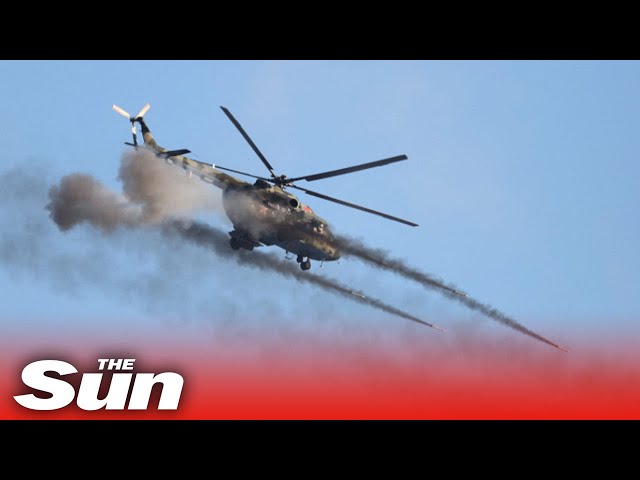 Moment 'Russian' helicopter is shot down over reservoir near Kyiv