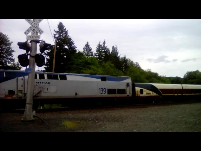 Amtrak Cascades talgo train going northbound on main track 2 video 2 of 3 on flag day