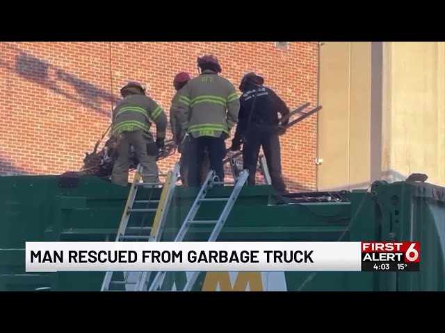 Man rescued from garbage truck in Omaha