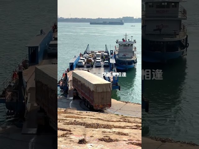 Semi-trailer is boarding the ferry to cross the river. Ferry crossing the river. Lifestyle photo