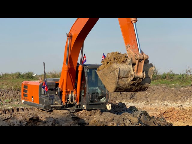 HITACHI ZAXIS 210 LCH and Dump Truck: A Relentless Duo Conquering a 9-Day Earthmoving Marathon!