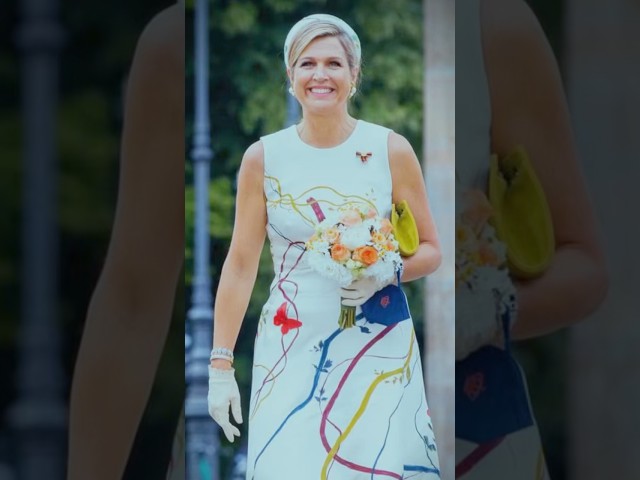 Queen Máxima of the Netherlands wearing a dress with butterflies 🦋